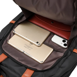 Internal layout of waterproof nylon backpack showing laptop compartment and pockets