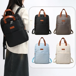 Detail view of large capacity waterproof backpack in black, gray, blue and beige colors