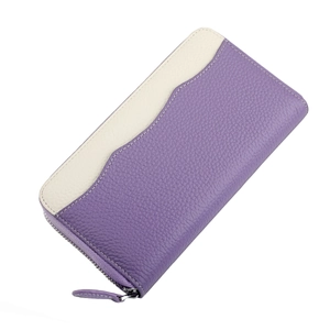 Detail of purple and cream leather wallet with lychee pattern and silver zipper