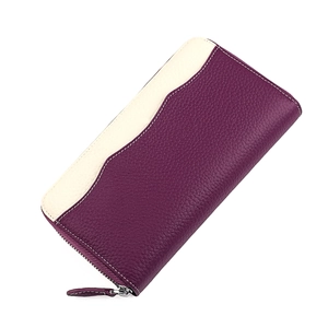 Macro view of long leather wallet with lychee grain texture and stitching details