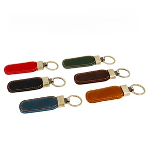 Detailed view of handmade crazy horse leather keychains in six vintage colors with gold hardware