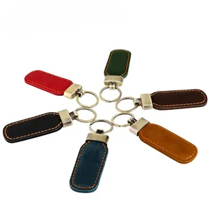 Showcasing six colors of vintage crazy horse leather keychains with hand-stitched detail