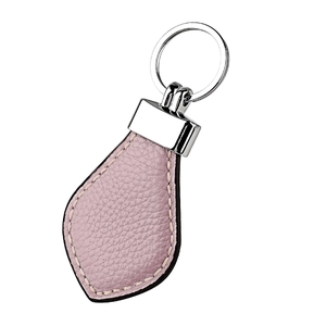 Detailed view of lavender lychee grain leather keychain with silver metal ring