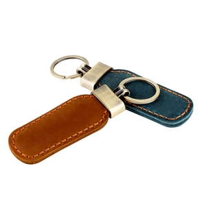 Handmade crazy horse leather keychain set in brown and dark blue with bronze hardware