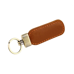 Vintage crazy horse leather keychain with bronze metal ring in a 45-degree view