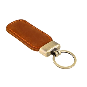Vintage crazy horse leather keychain with bronze hardware and rustic orange stitching