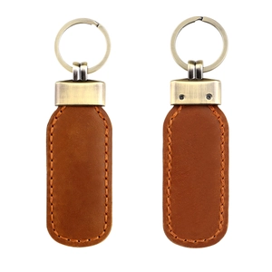 Vintage brown crazy horse leather keychain with bronze alloy buckle on white background