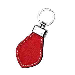 Red genuine leather car keychain with lychee texture and white stitching details