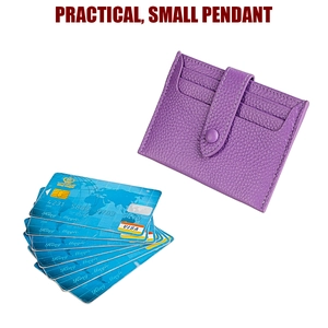 Detail of purple leather RFID card holder featuring lychee texture and snap fastener