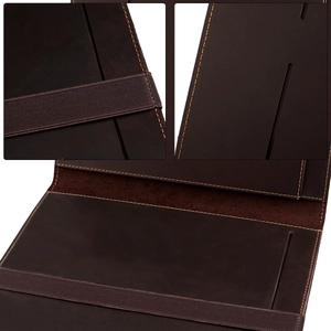 Close-up of deep brown crazy horse leather B5 notebook cover with elastic band and stitching