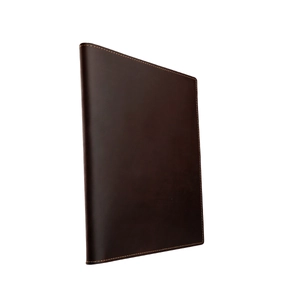 Detail of premium dark brown crazy horse leather cover with precise contrast stitching