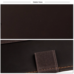 Detail of dark brown crazy horse leather sleeve with stitched edges and elastic pen loop