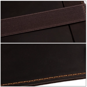 Macro detail of crazy horse leather stitching and elastic pen loop for B5 notebook