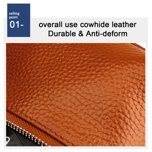 Détail macro du cuir de vachette marron avec texture litchi et zip argenté résistant