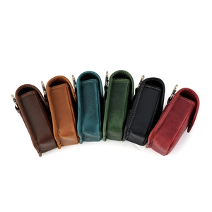 Set of six vintage crazy horse leather waist pouches in various retro colors