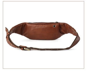 Macro detail of brown leather waist bag with lychee texture and earphone port