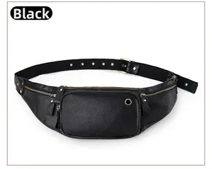 Detail of black lychee leather waist bag with gold zippers and metal earphone hole