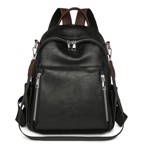 Minimalistischer schwarzer PU-Lederrucksack mit braunen Trägern und silbernen Reißverschlüssen