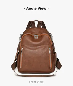 Detailansicht brauner Vintage-Lederrucksack mit doppelten silbernen Vertikal-Reißverschlüssen
