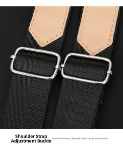 Macro shot of durable silver metal adjustment buckles on black nylon backpack straps