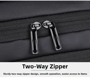 Close-up of smooth two-way matte metal zippers and waterproof textured fabric on business backpack