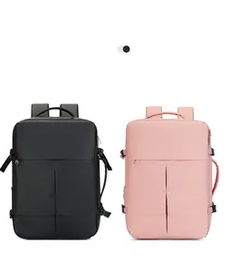Detail view of the side compression straps and top handle on the business travel backpack