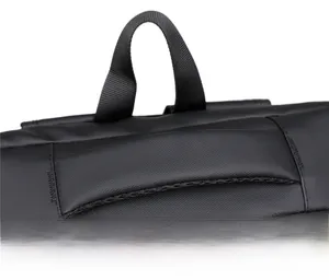 Detail of the thick padded handle with reinforced stitching on black business backpack