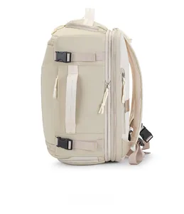Side view of beige travel backpack featuring ergonomic breathable mesh and side carry handle