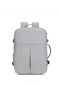 Detail of grey travel backpack showing the vertical pleated design and hidden zipper pocket