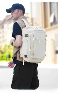 Outdoor urban view of a large beige breathable backpack with side adjustable buckles