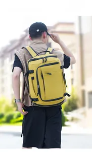 Outdoor yellow nylon backpack with multi-layer zipper compartments and side compression buckles