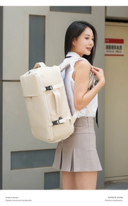 Travel backpack shown on a female model featuring side buckles and multiple compartments