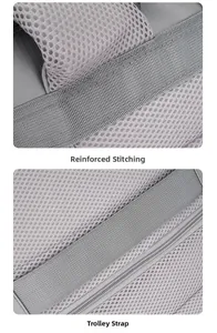 Detail of reinforced stitching and luggage trolley strap on grey business travel backpack
