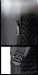 Detail of smooth metal zipper and adjustable buckle on black waterproof laptop backpack