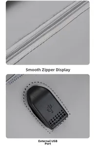 Detail of smooth metal zipper and external USB charging port on the gray travel backpack