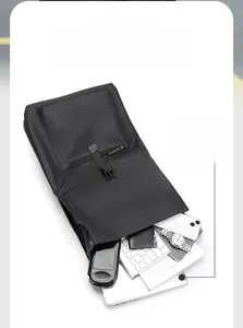 Detail showing high-capacity interior of waterproof black laptop bag for 15.6 inch devices