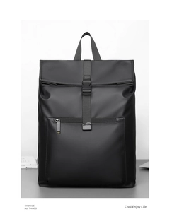 Front view of black waterproof business backpack with flap cover and buckle closure