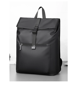 Detailed side view of black minimalist business backpack with roll-top and buckle