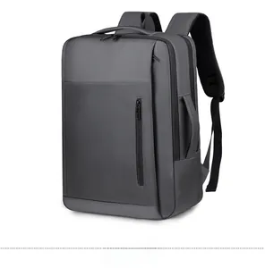 Detail view of water-resistant gray business laptop backpack with side handle and zipper
