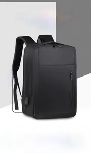 Macro view of water-resistant business laptop backpack featuring external USB charging port