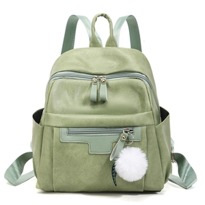 Mint green PU leather backpack for women with a white fuzzy pompom charm and front pocket