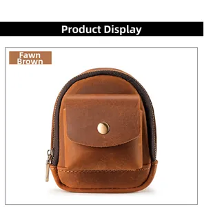 Detail of crazy horse brown leather pouch showing fine stitching and metal snap button