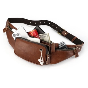 Brown leather waist bag for men with multiple pockets and adjustable strap shown with essentials