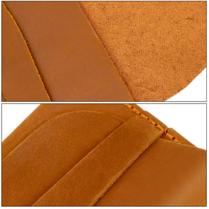 Détail macro du portefeuille en cuir crazy horse marron avec surpiqûres de précision