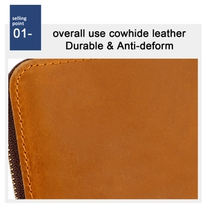 Close-up of durable cowhide leather texture and sturdy zipper on short wallet