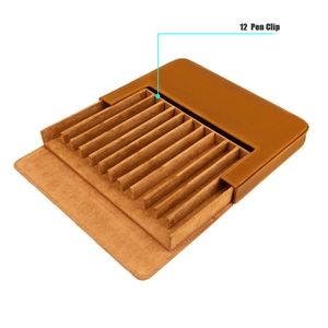 Detail of 12 individual leather slots with velvet lining in a drawer pen case