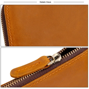 Macro shot of crazy horse leather texture with handmade stitching and vintage metal zipper
