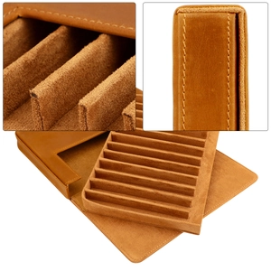Detailed view of brown leather pen case with 10 slots and soft suede lining