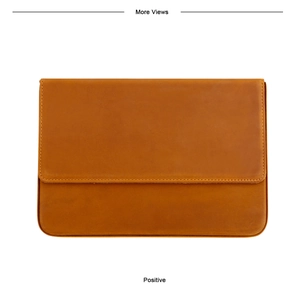 Front view of brown leather stationery case with fine stitching and magnetic flap closure