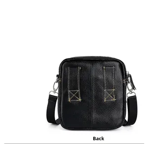 Back view of black pebbled leather crossbody bag with reinforced belt loops for waist use